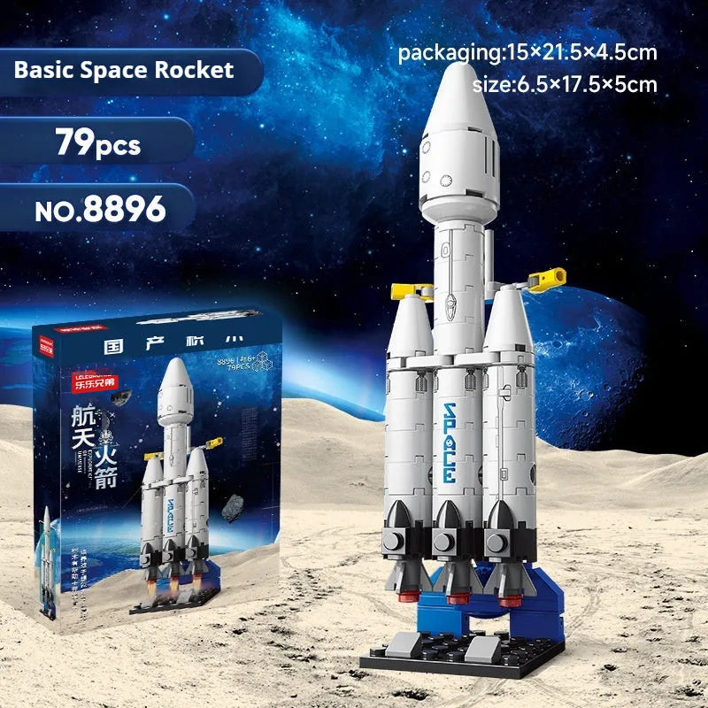 Colour box packaging of space rocket building blocks featuring space station, starship, Apollo 5, Falcon Heavy rocket, and dragon flying ship sets
