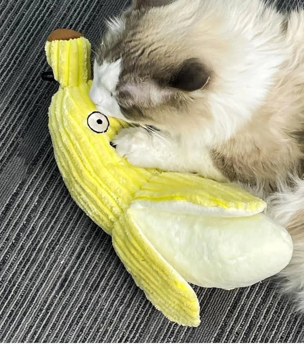 Yellow banana cat toy with crinkle paper and plush fabric for indoor cat play