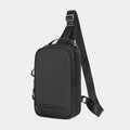 Casual black TPU camouflage chest bag with adjustable strap and front sandwich pocket on a person.