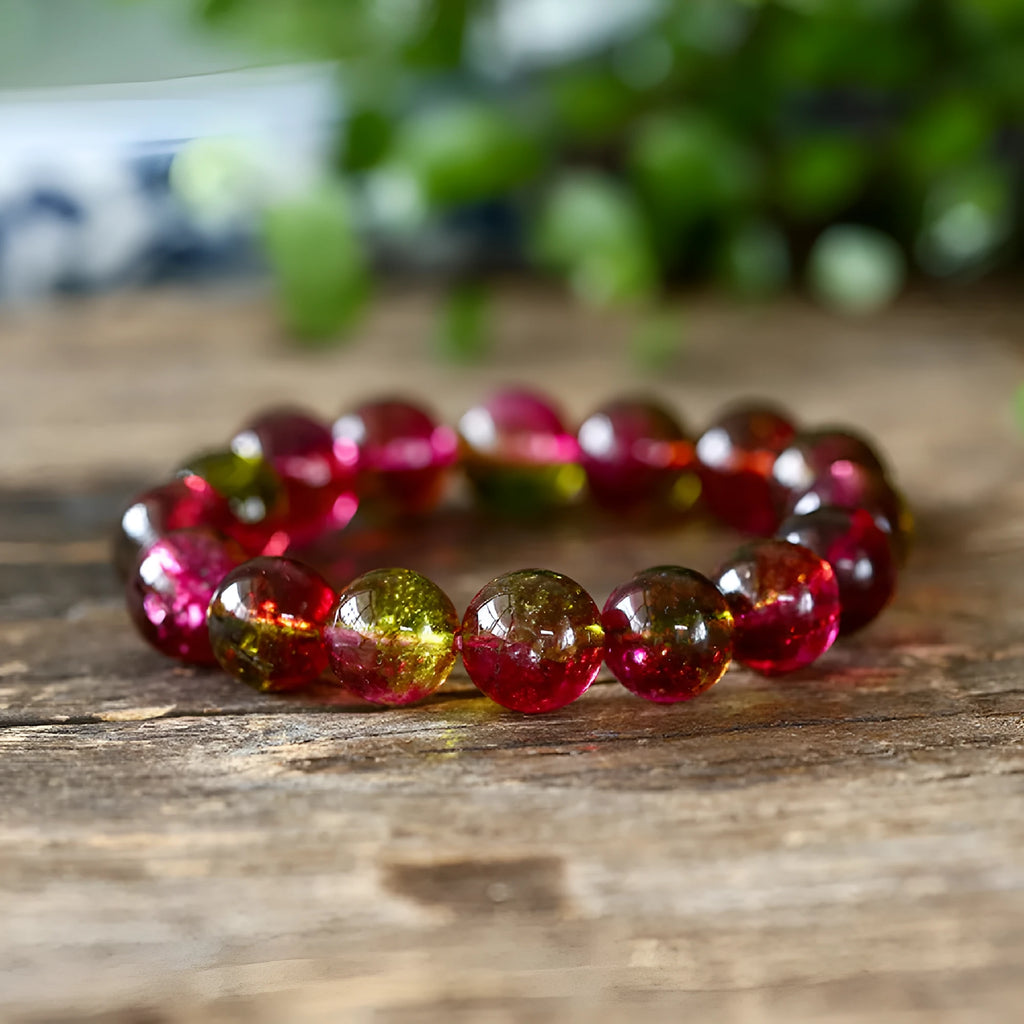 Handmade watermelon crystal bracelet showing natural colouration and bead detailing
