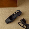 Women's beige woven hollow-out sandals with square toe, chunky heel, and buckle fastening on a white background.