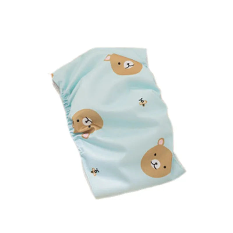 Reusable cartoon bone print dog diaper with fastener tape and elastic waistband, shown in blue bear pattern.