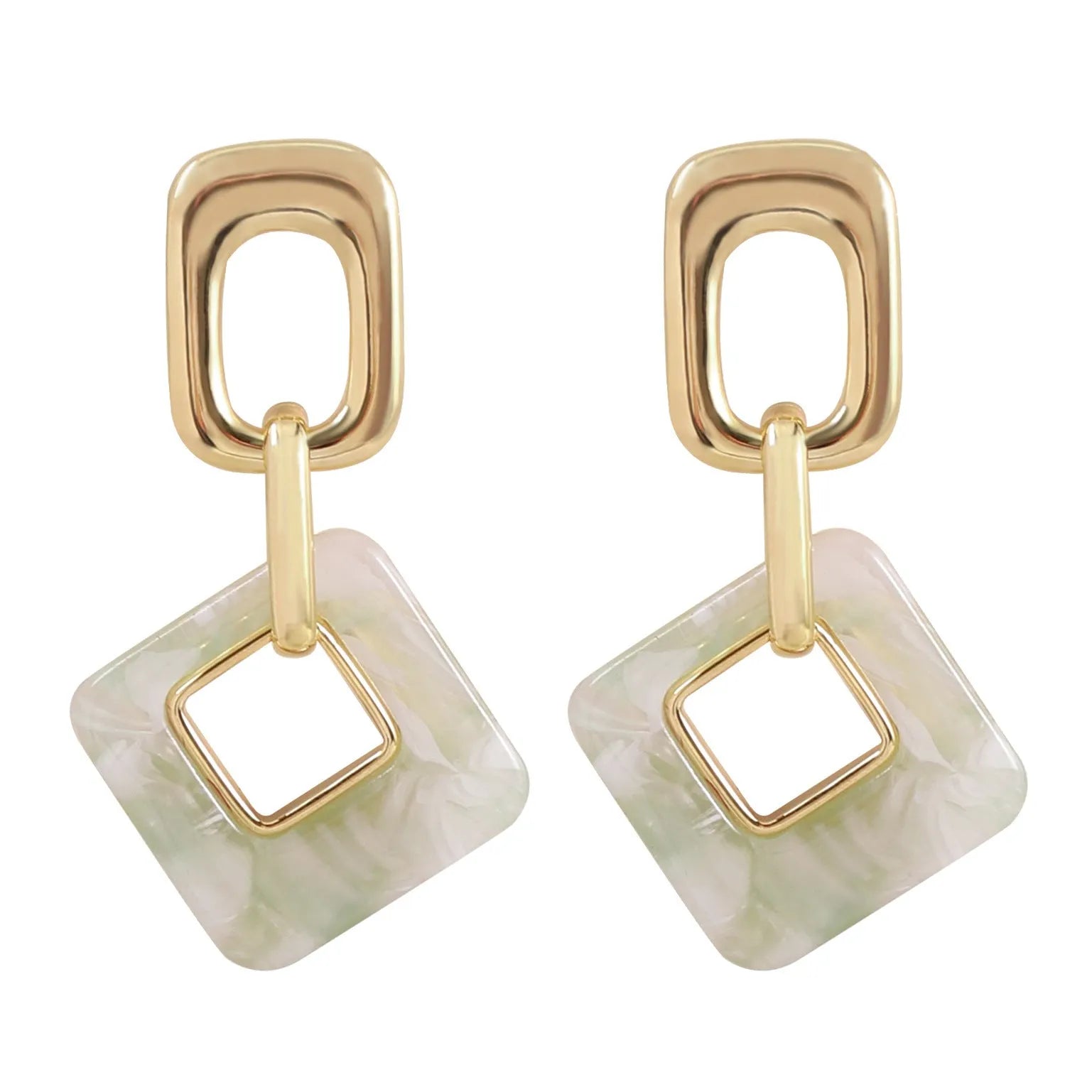 A pair of hollow geometric square copper earrings with chamfered corners on a white background.