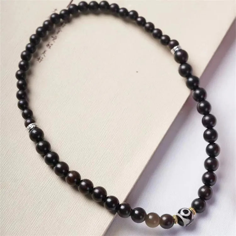 Ebony wood Tibetan prayer bead bracelet with 8mm beads in two-circle design