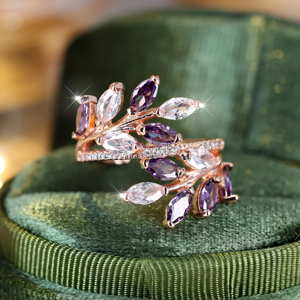 Adjustable copper leaf fashion ring with a central horse eye zircon stone, shown in a rose gold finish.