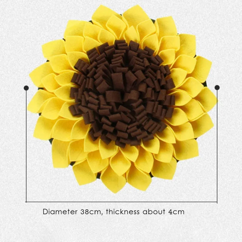 Yellow sunflower-shaped dog snuffle mat with fleece surface and a rope for hanging