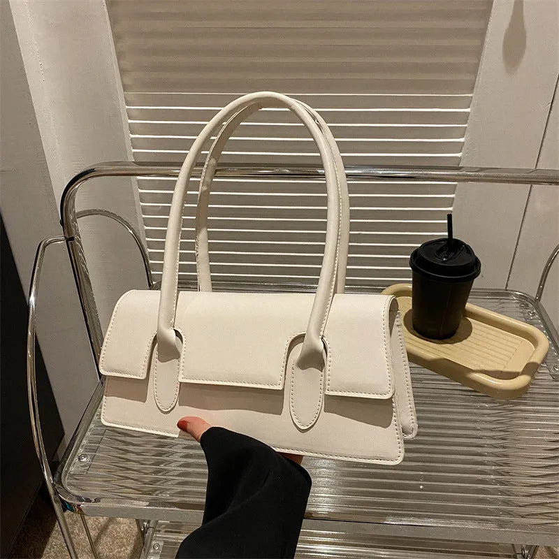 Women's small square shoulder bag in PU leather with stitching detail