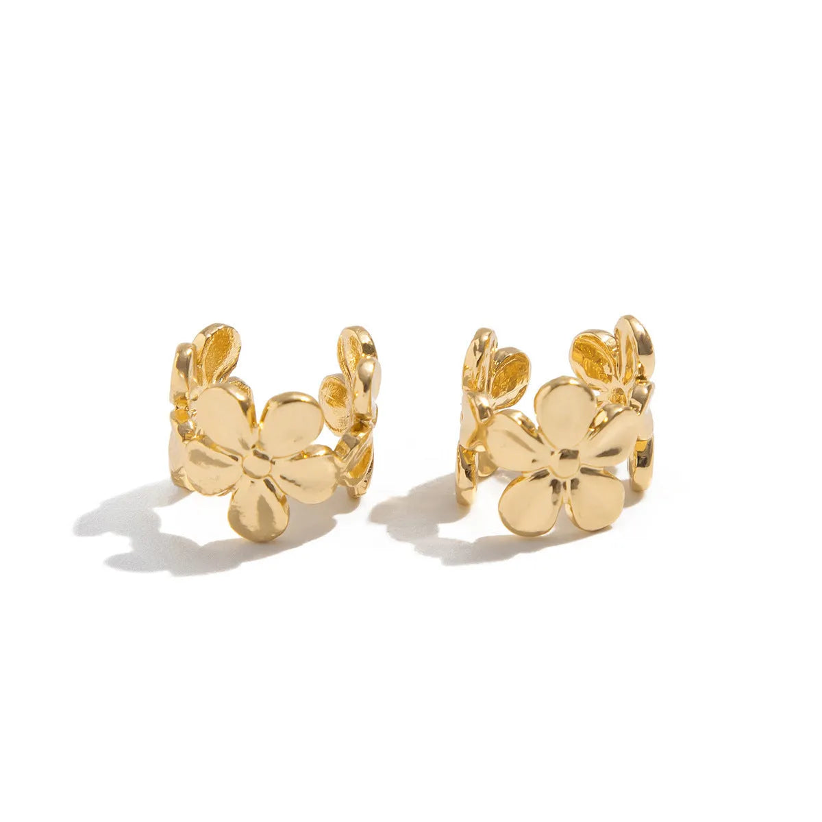 Gold-coloured alloy drop earrings with starfish and scallop designs for women.
