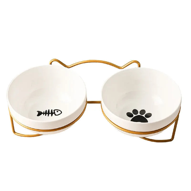 White ceramic pet bowl with iron frame featuring cat ear design, decorated with cat footprints pattern