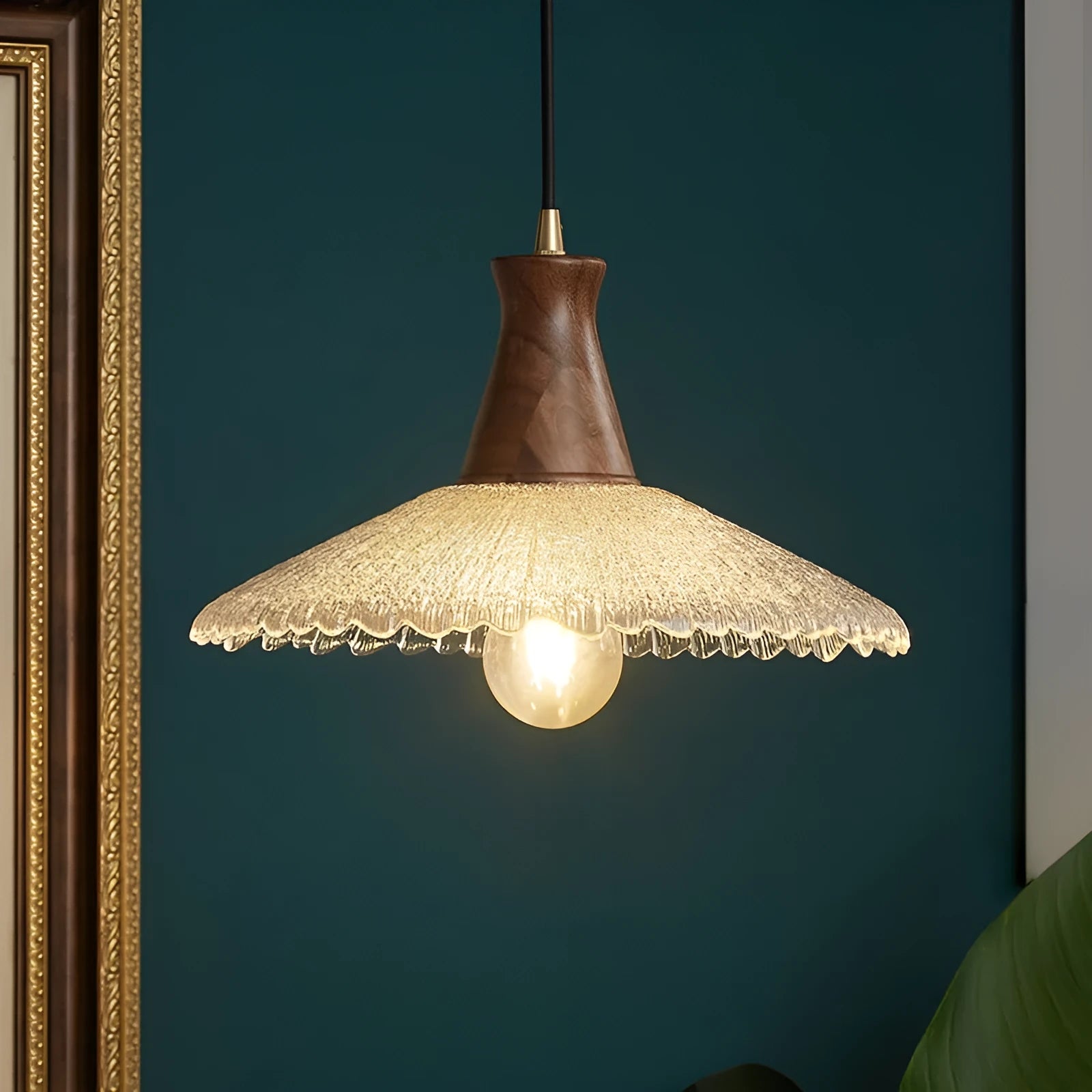 Brass-toned wood and glass chandelier with a retro design for ceiling mounting.