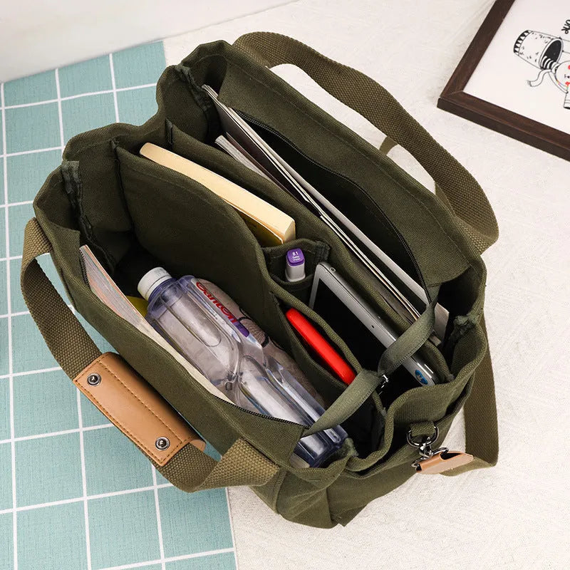 Large canvas tote bag with internal organisation pockets in neutral colour