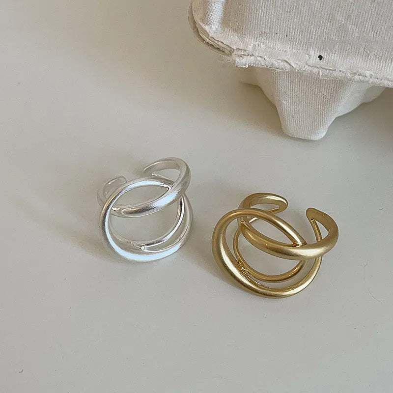 Three-dimensional interlaced geometric open ring in matte gold or silver electroplated finish