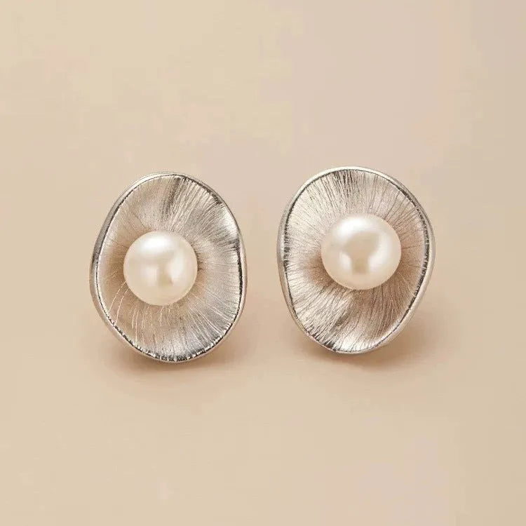 Gold geometric earrings with freshwater pearls on sterling silver posts and butterfly clasps