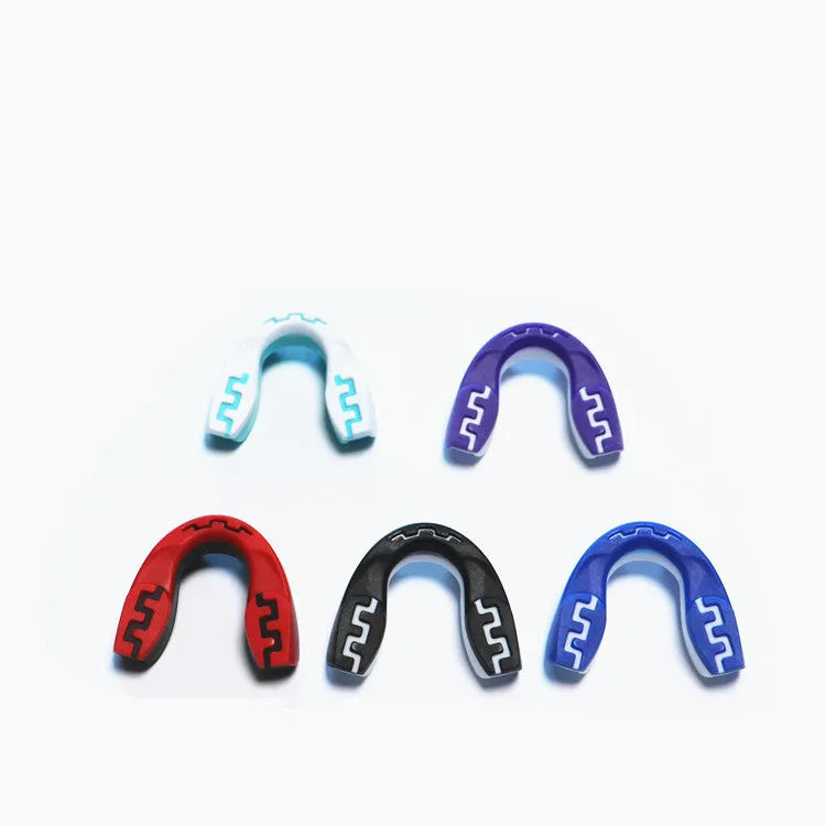 Adult boxing mouthguard with printed teeth design in choice of colours, shown with protective case.