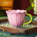Ceramic breakfast cup with floral pattern, 500ml capacity, in red or purple.
