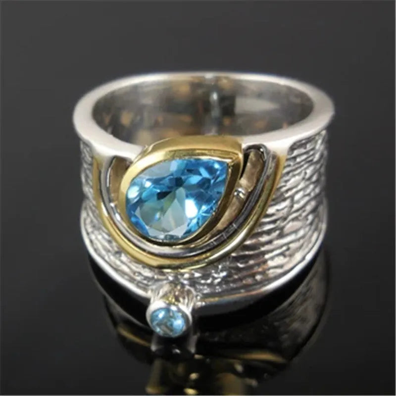 Blue Chinese-style alloy women's ring with inlaid zircon rhinestones in a drop shape.