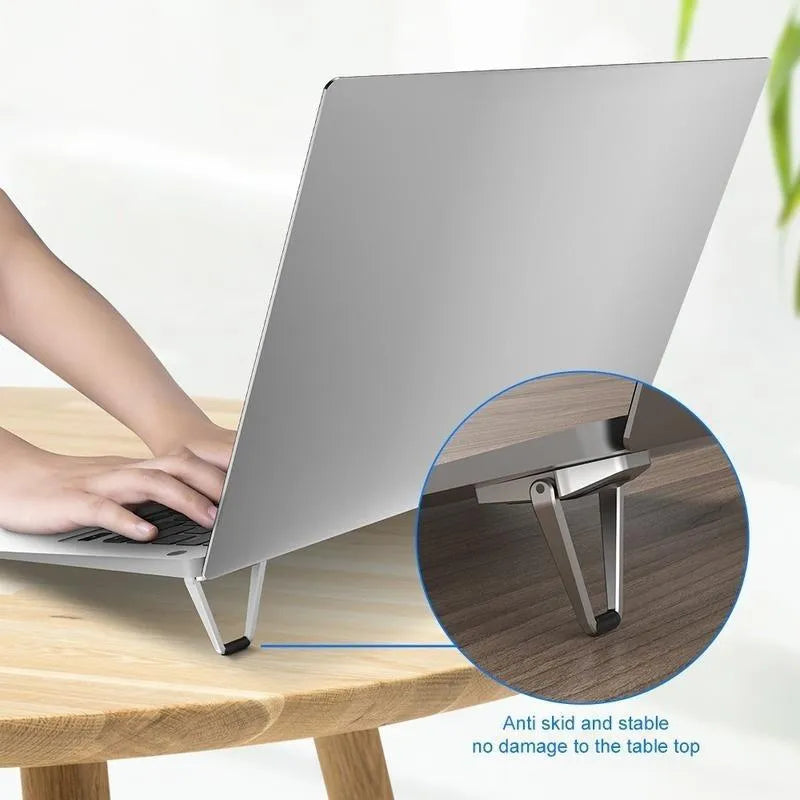 Foldable aluminium laptop bracket with 3M adhesive measuring 4.8cm x 3.5cm