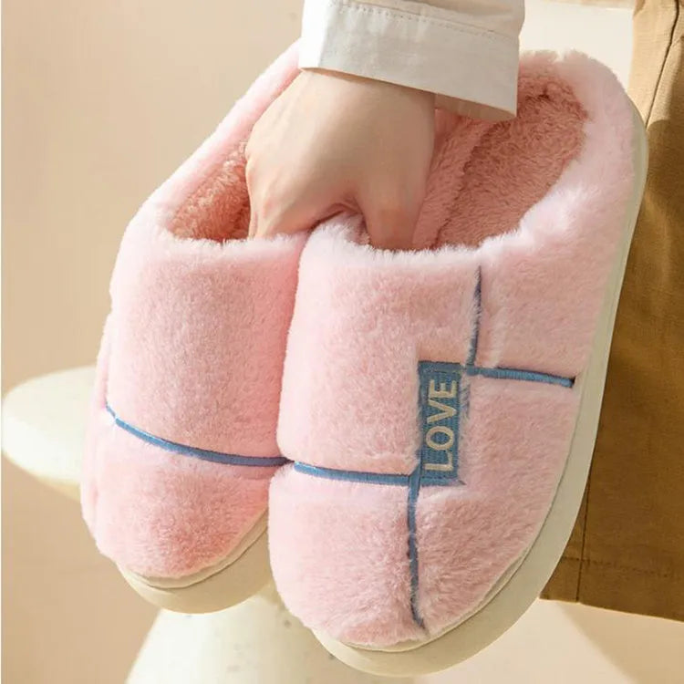 Women's indoor furry slippers in solid colour with plush upper and rubber sole for winter warmth