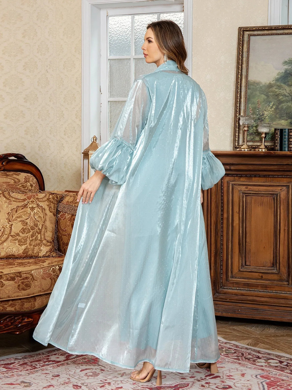 Brown Arabic two-piece dress with long sleeves, rhinestone detailing, and full-length skirt