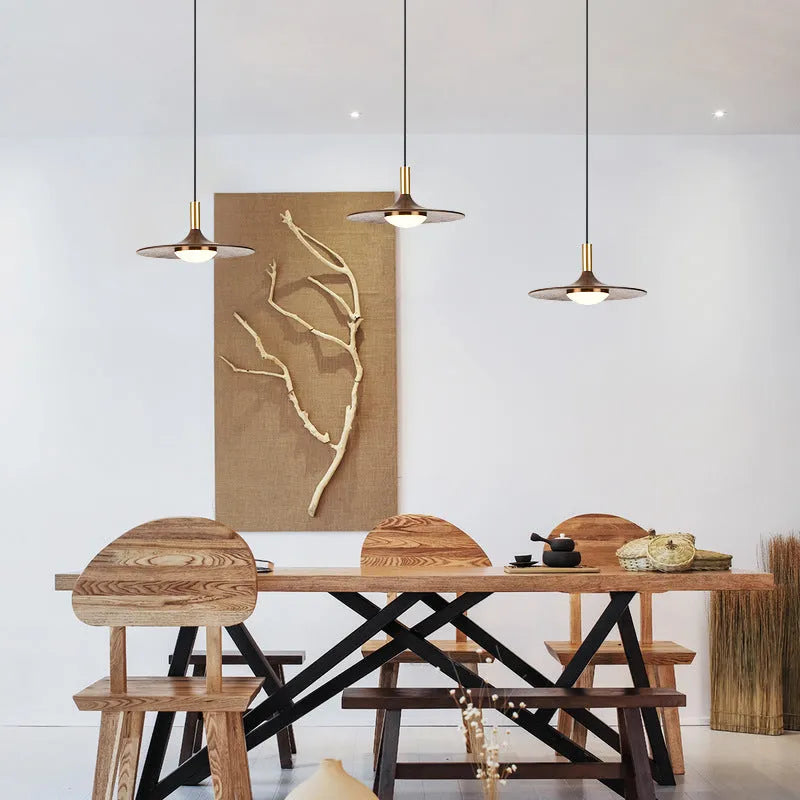 Wood and copper bar-style chandelier light fixture with push-button switch.