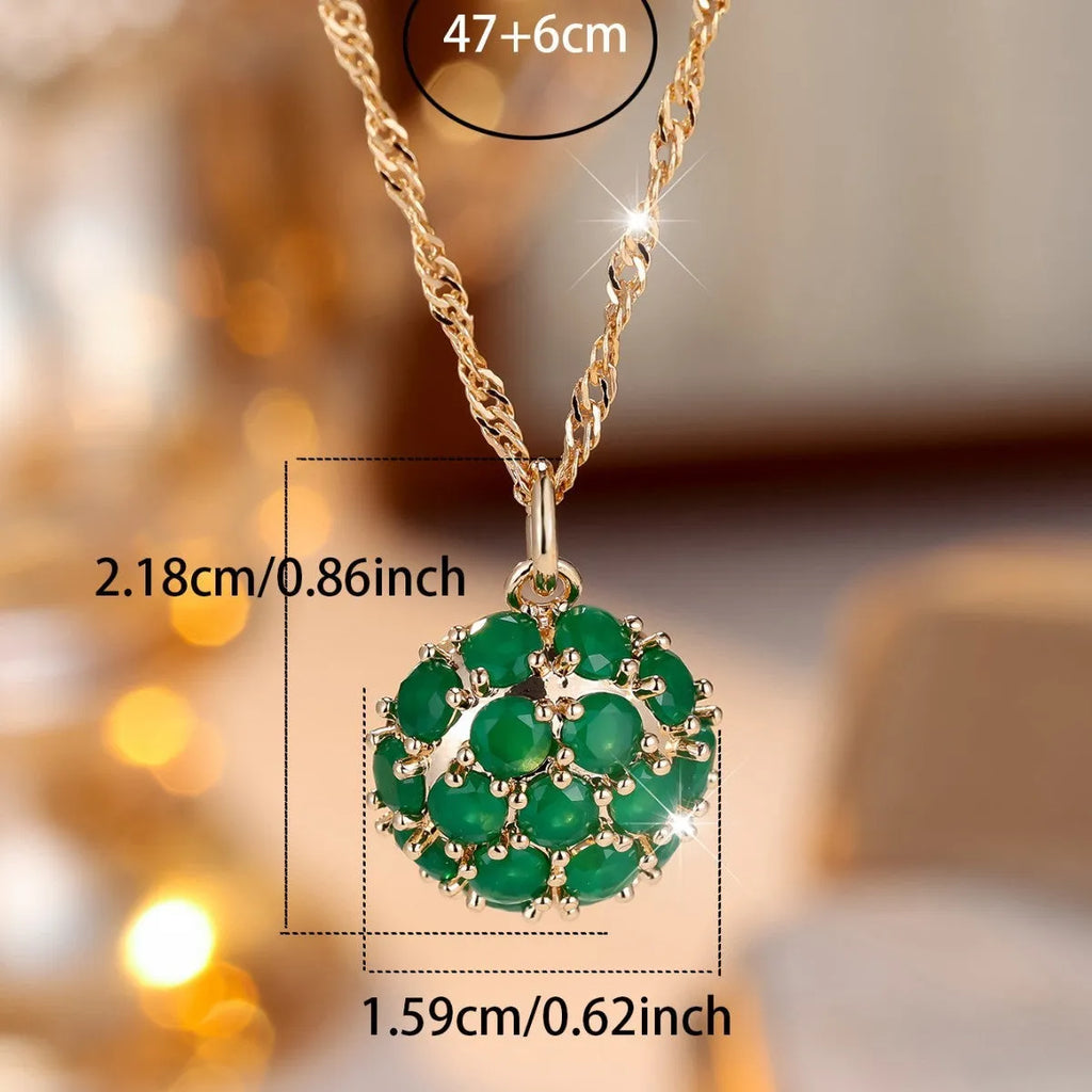 Round emerald diamond necklace with geometric pendant on gold plated chain
