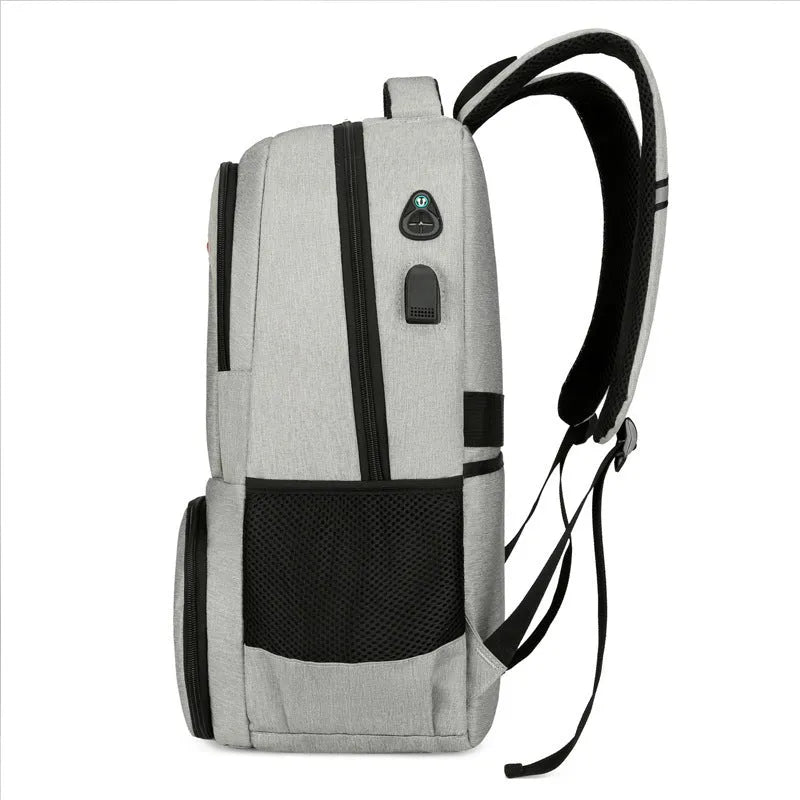 Insulated oxford cloth backpack in light grey showing curved shoulder straps and dry-wet separation compartment.
