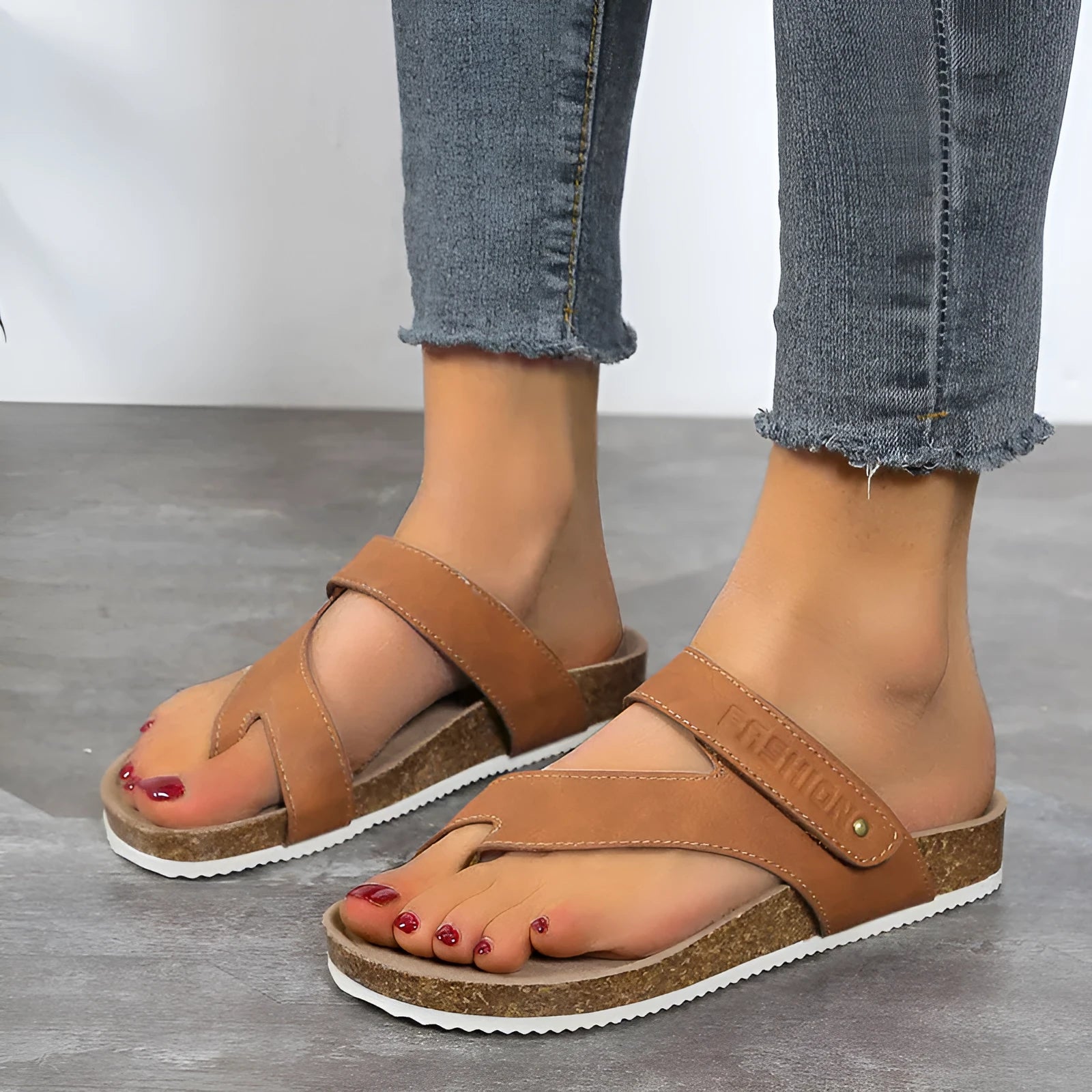 Flat toe ring thick-soled flip-flops in blue, showing foam sole and PU upper.