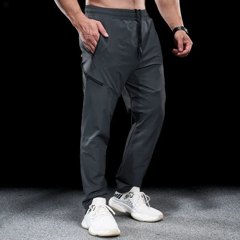 Men's waterproof quick-drying workout trousers in nylon available in Army Green, Black, Dark Gray, Khaki, and Beige colours