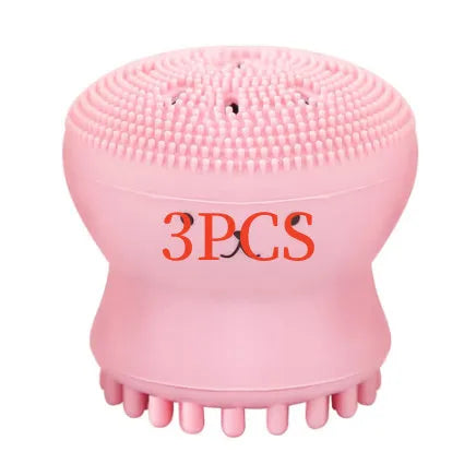 Cartoon octopus silicone wash brush in pink for manual facial cleansing and massage