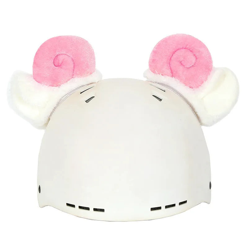 Plush fabric cartoon character helmet cover stretched over a blue hat for children's dress-up.