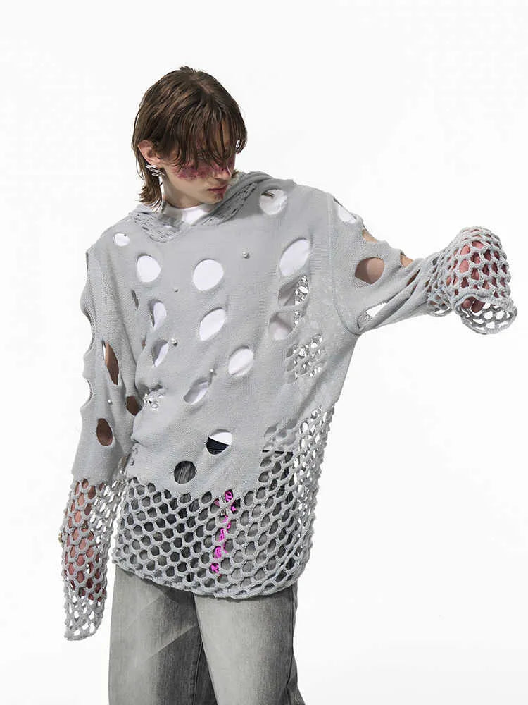 Black men's loose fit pullover hoodie with decorative pearls on the front of the hood.