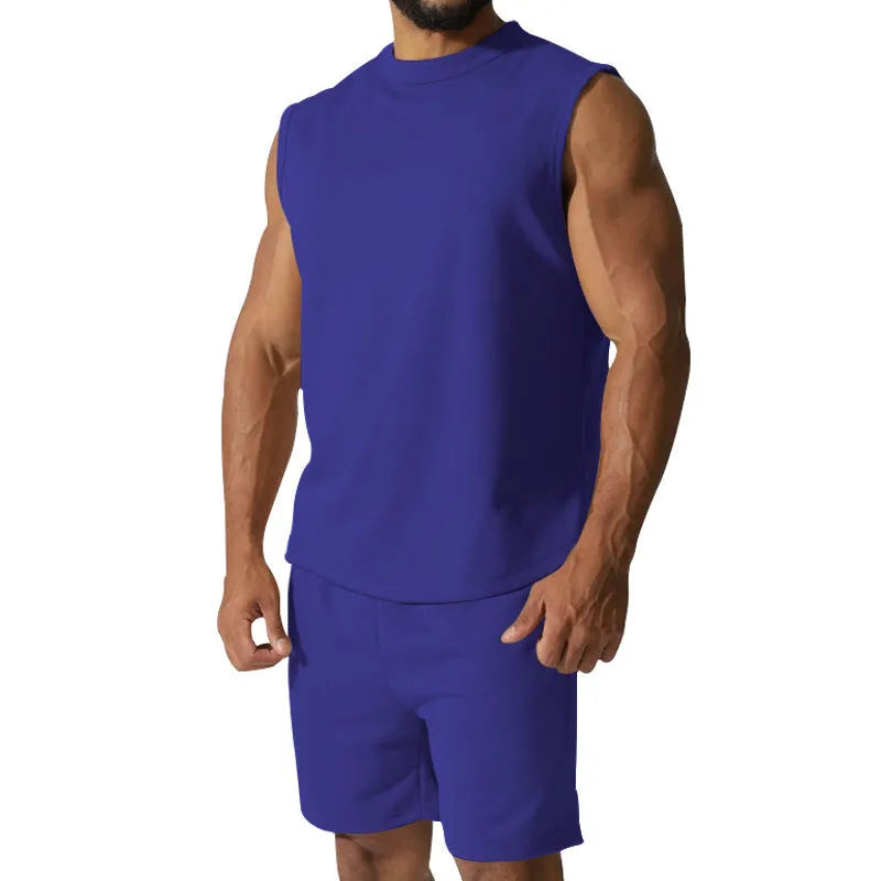 Men's sleeveless cotton blend sports top and matching shorts in a solid colour, laid flat.