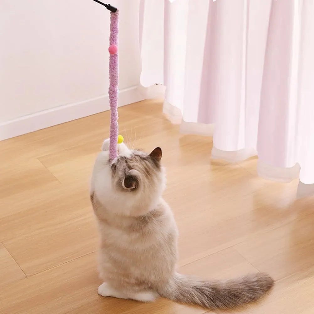 Blue green or pink cat wand toy with plush strip and bell for interactive indoor play