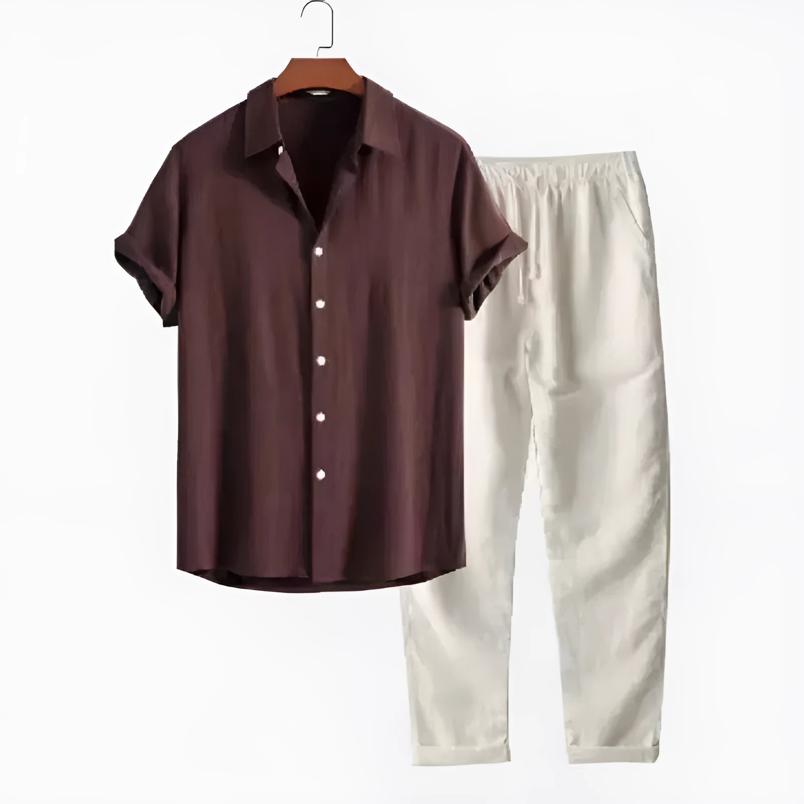 Man wearing a loose-fit short sleeve shirt and matching trousers from a casual linen-look polyester suit.