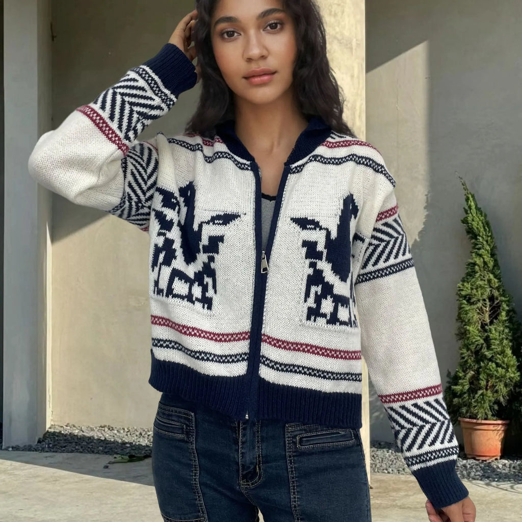 White women's zip-front cardigan with lapel collar and contrasting jacquard stripe pattern.