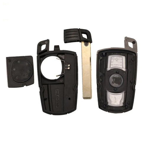 BMW semi-intelligent remote car key fob replacement unit containing three keys.