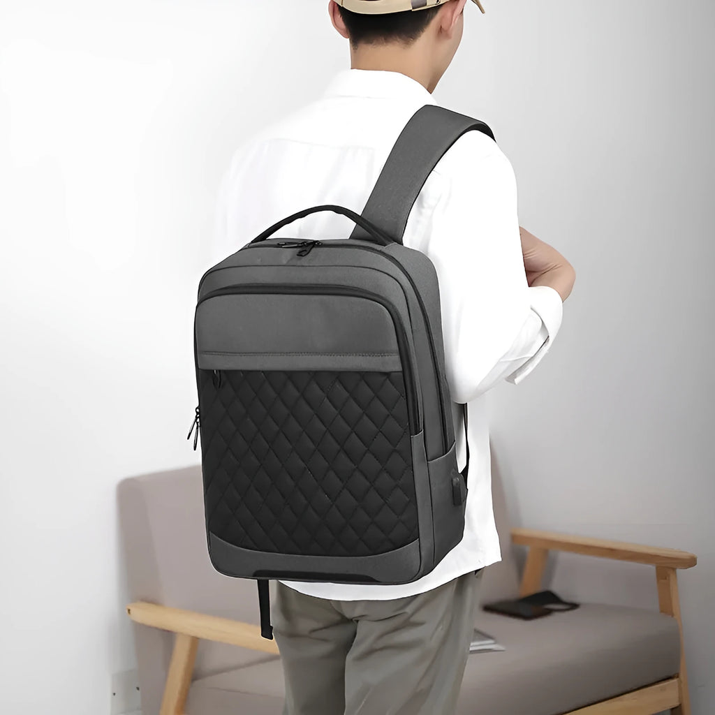 Men's Oxford cloth backpack with curved shoulder straps and diamond mesh details in solid colour