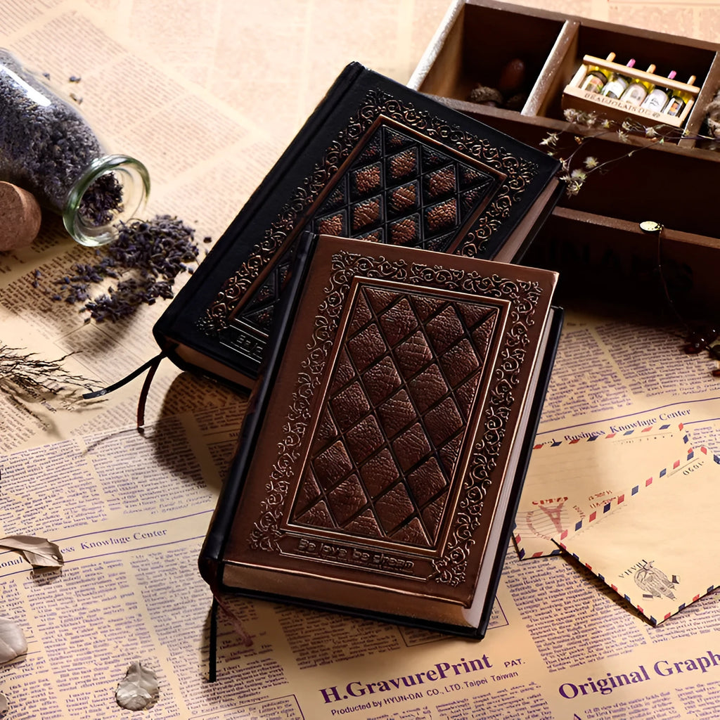Embossed faux leather notepad with three-dimensional textured cover in bronze or black gold colour