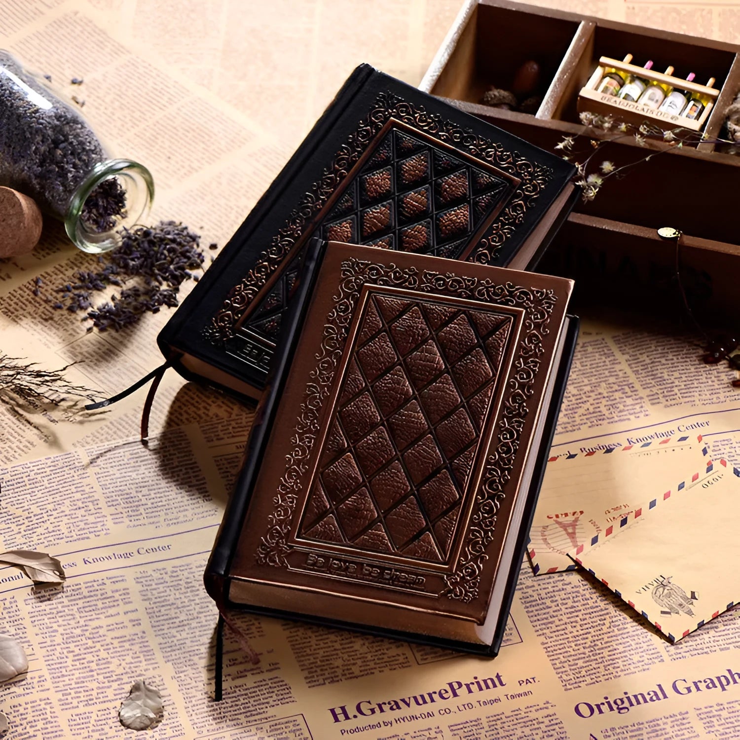Embossed faux leather notepad with three-dimensional textured cover in bronze or black gold colour