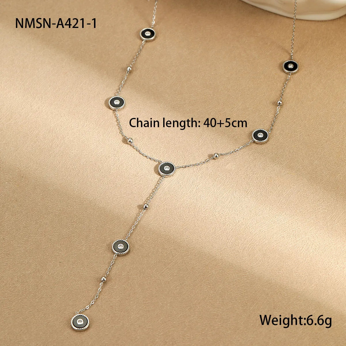 Women's stainless steel bracelet and necklace set with 18K gold plating and geometric design.
