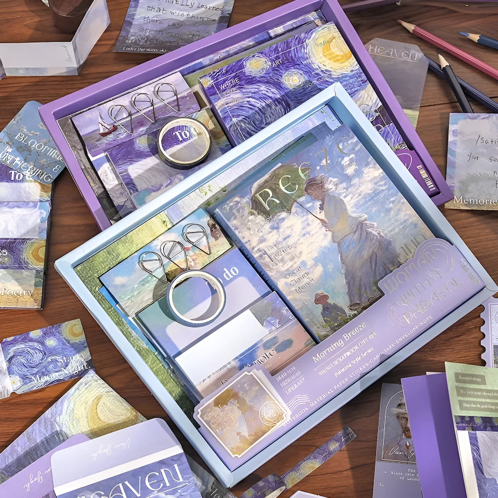 Hand Account Suit creative journal gift box open to show A6 grid notebook, assorted papers, cards, stickers, and a water drop bookmark.