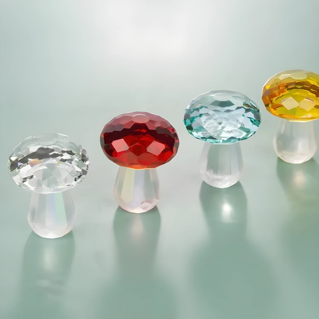 Small solid crystal mushroom ornament in modern geometric style on a wooden surface.