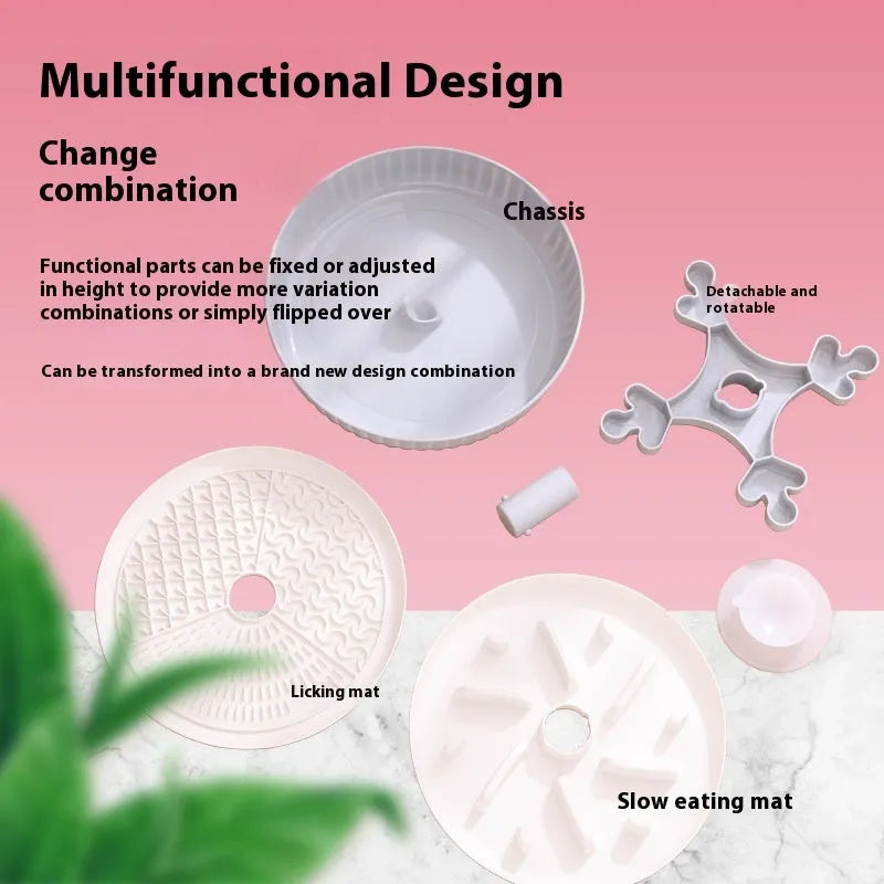 Grey plastic slow feeder pet bowl with windmill pattern and white non-slip silicone base on a kitchen floor.