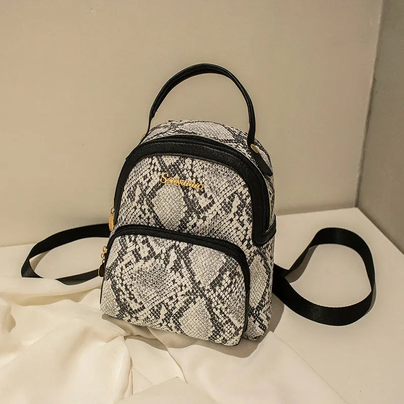 Girls' small PU backpack in Korean style with front pocket, in Snake White colour