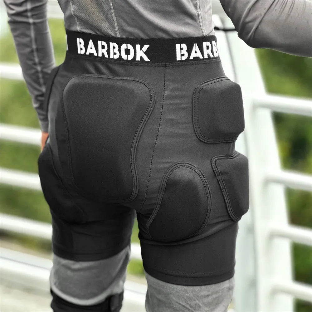 Black spandex hip protection pants with removable NBR foam padding for roller skating and skateboarding safety.