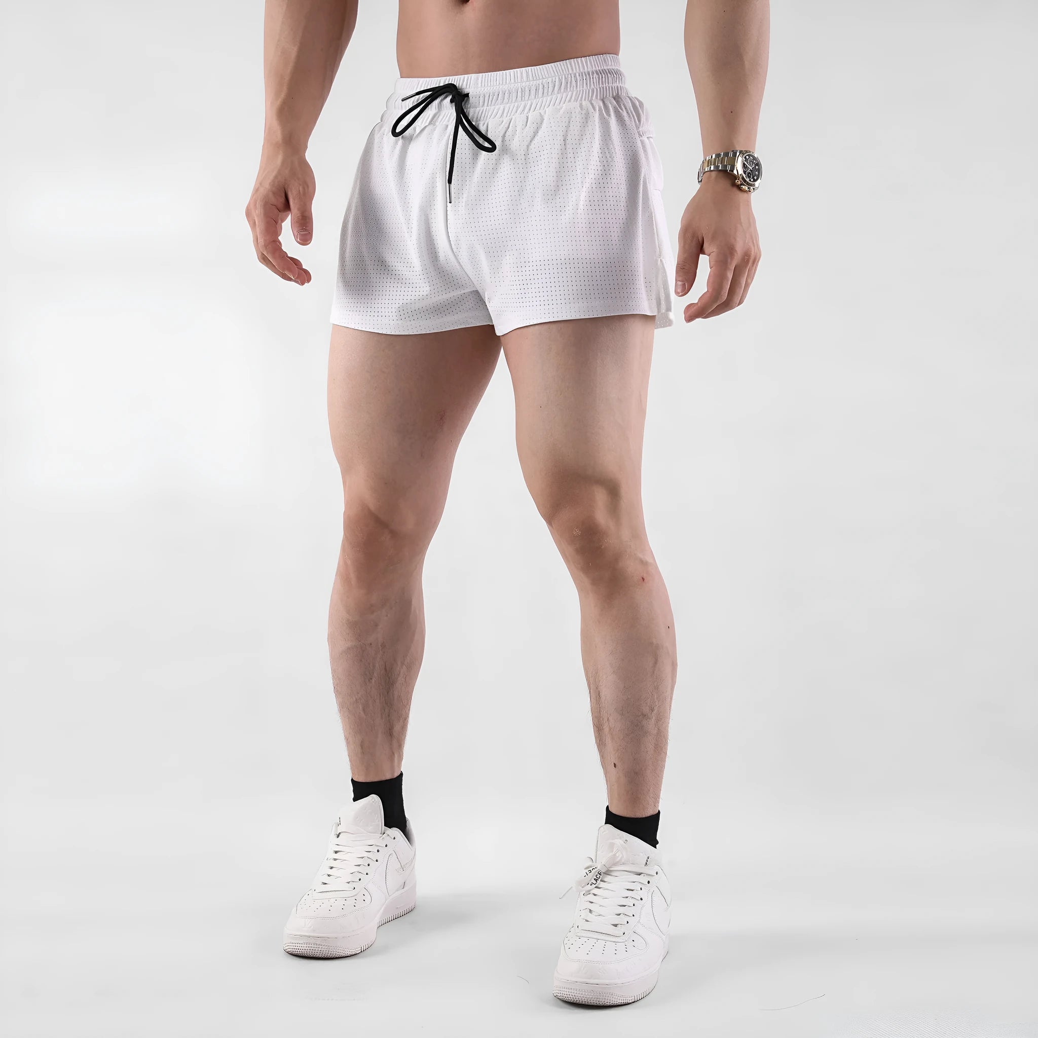 Men's white and black quick-drying nylon summer shorts with a mid-waist fit.