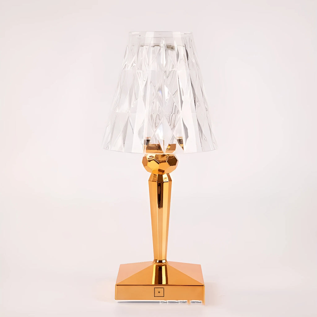 Rose gold portable touch control night light on a surface, showing its acrylic lamp holder.