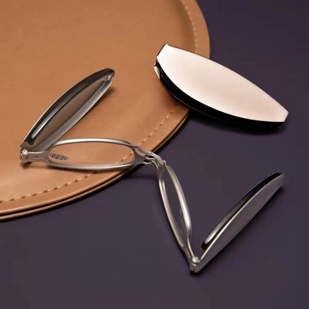 Folding presbyopic reading glasses in black frame shown open and folded with protective case