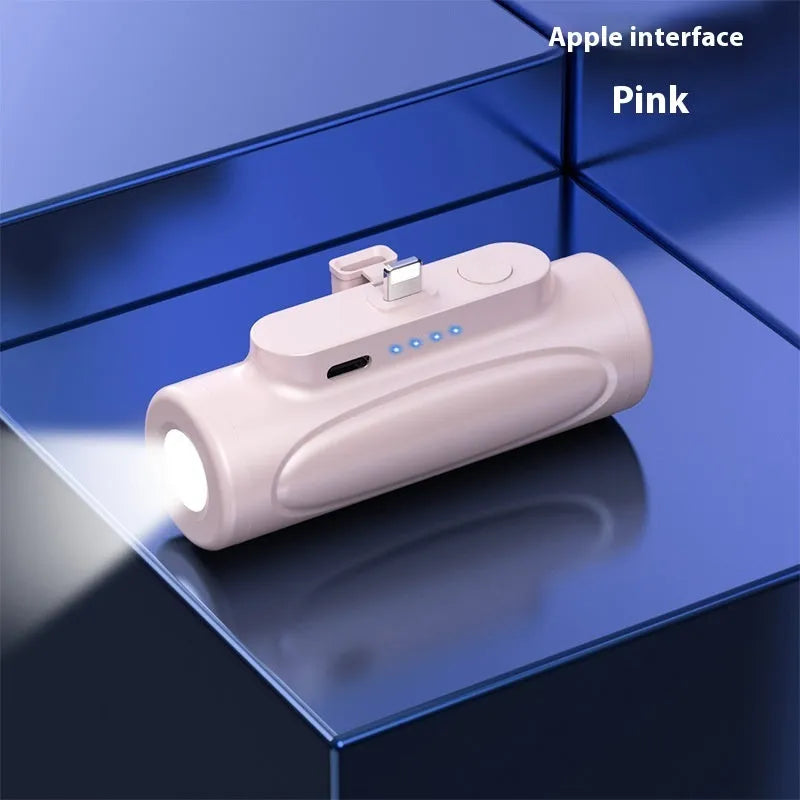 Black creative power bank with integrated LED flashlight, showing USB-C port, dimensions 83x27x41mm.