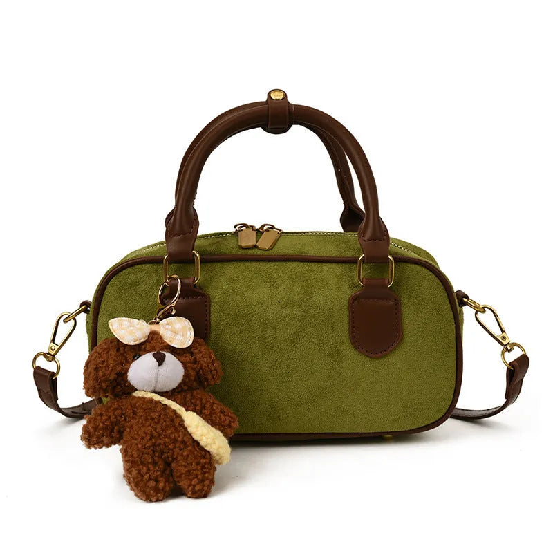 American retro PU leather bowling bag in brown with pendant and crossbody strap